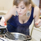Illustration for article titled Strange Busty Russian Lady, Why in the Hell Are You Cooking Your Galaxy Nexus?